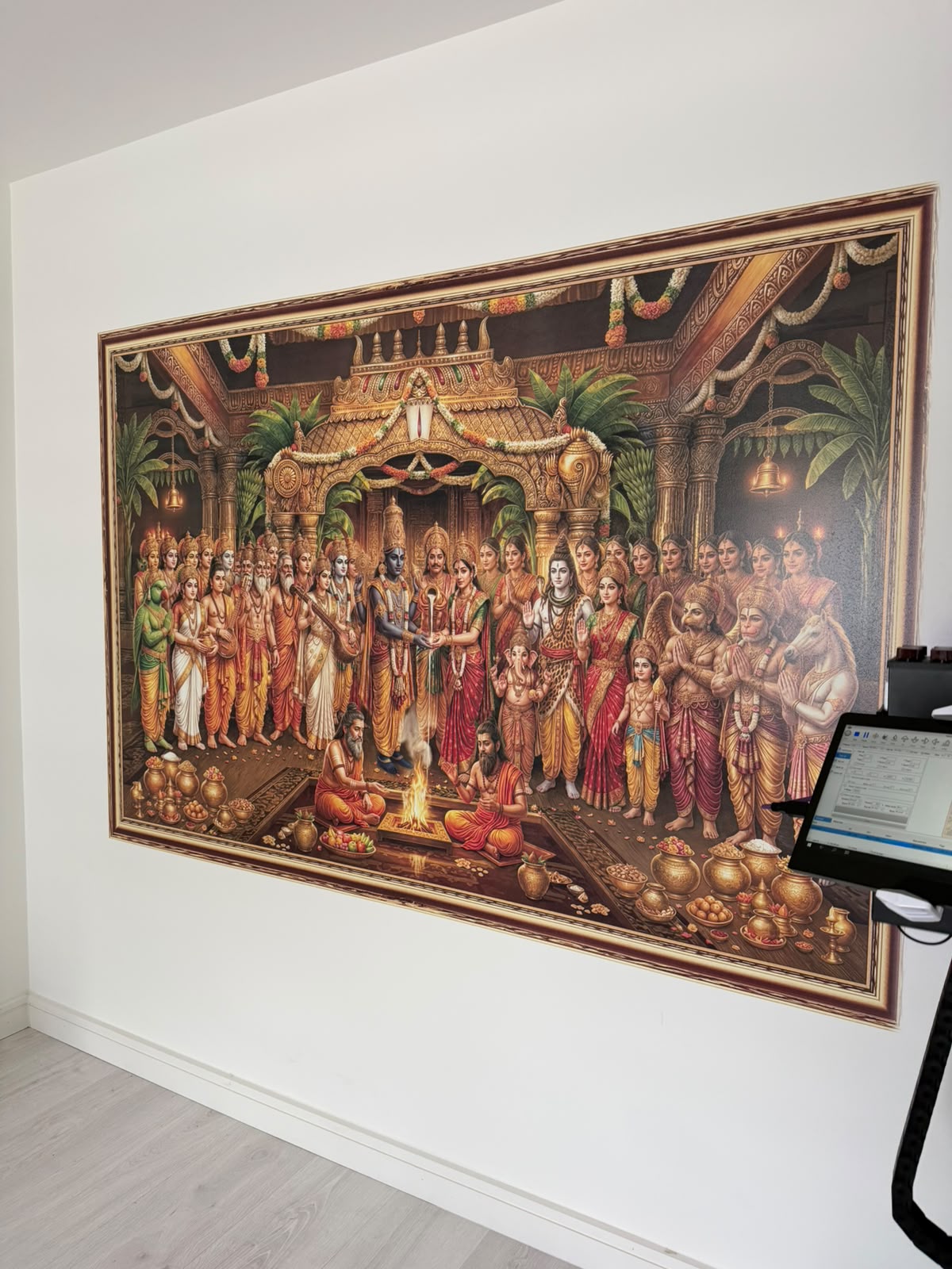 Detailed devotional scene mural printed on a wall