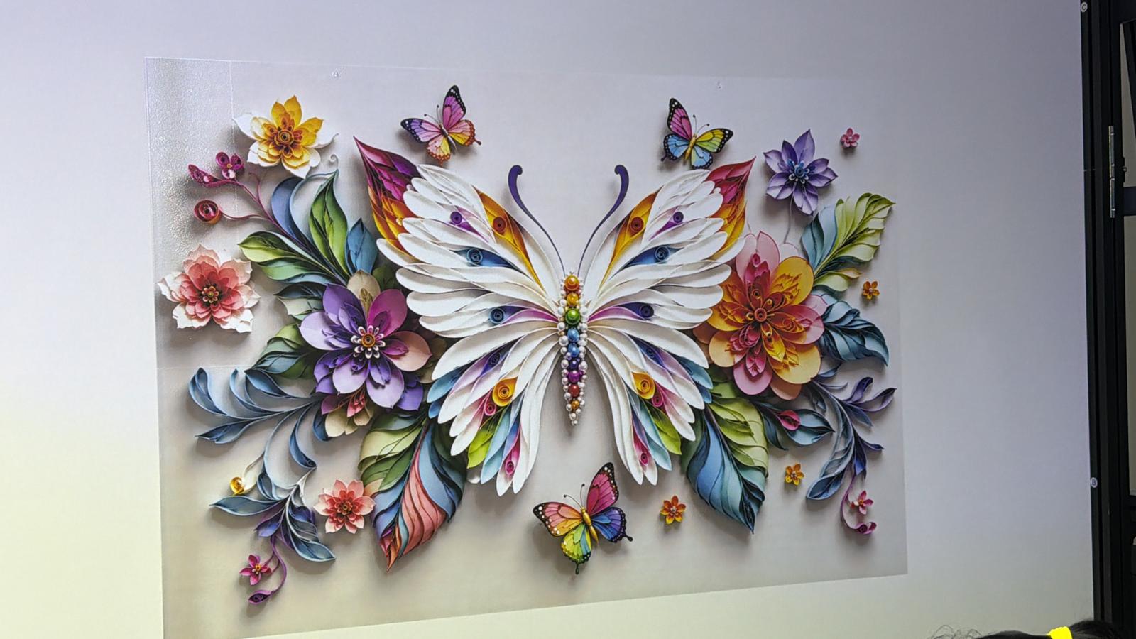 Vibrant 3D butterfly and floral mural printed on a wall