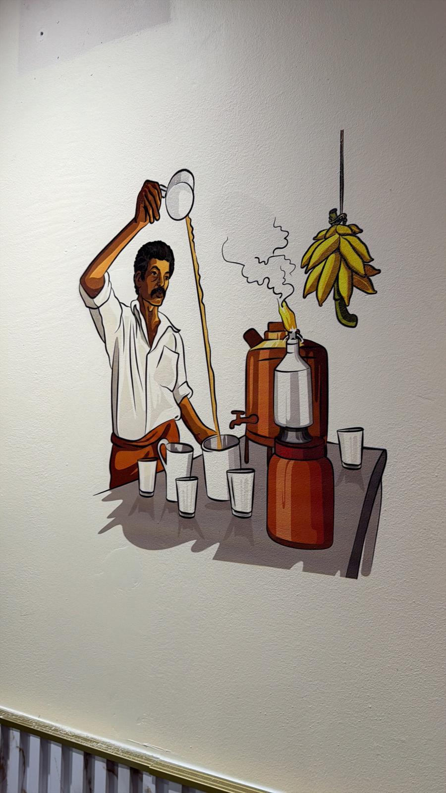Illustrated chai vendor mural in a restaurant